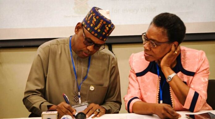 The Honourable Minister of State, Water Resources and Sanitation, Rt. Hon. Bello Muhammad Goronyo Esq with the Director, Water Quality Control and Sanitation Mrs. Elizabeth Ugoh