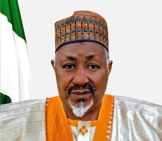 Honourable Minister of Defence, His Excellency Mohammed Badaru Abubakar, CON, mni,