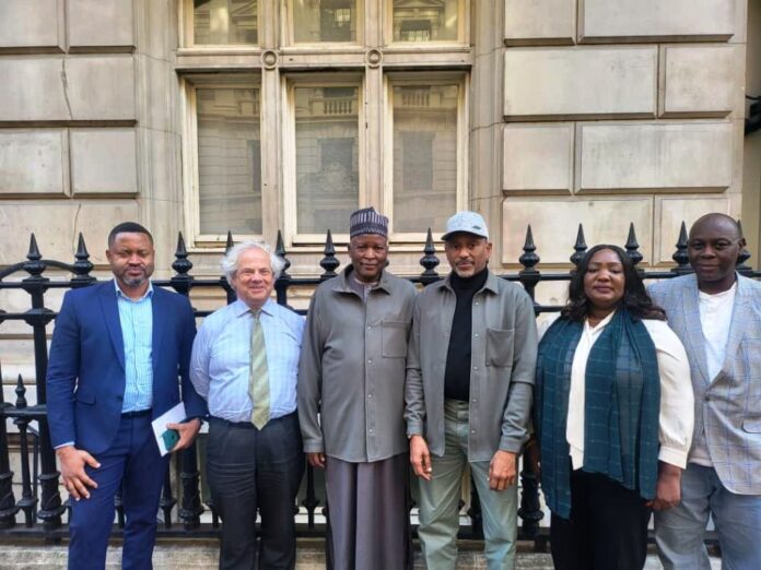 Housing Ministry Partners Notable UK Land Valuation Agency Hon Minister of State, Housing and Urban Development, Abdullahi Tijjani Gwarzo in a group photograph with Jeremy Moody, Secretary and Adviser CAAV and other officials of the Ministry during the meeting
