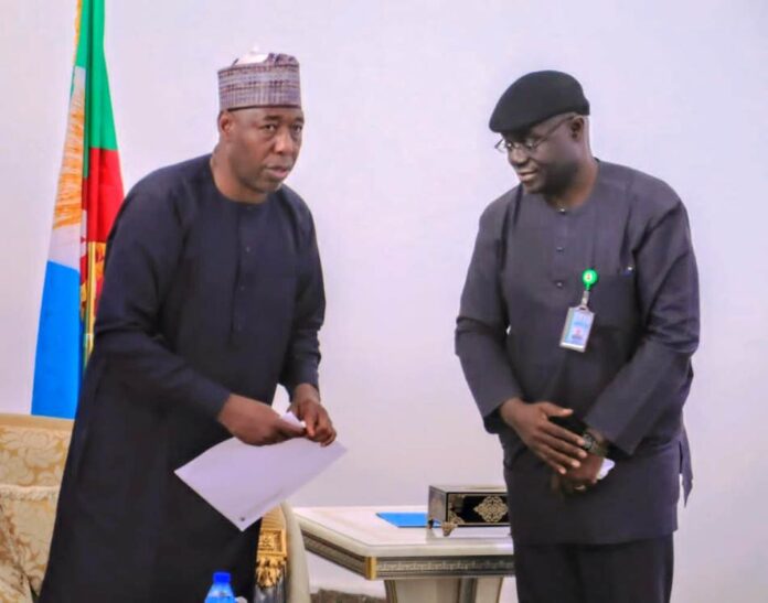 Humanitarian Ministry and Borno Flood01 (Left to Right) The Executive Governor of Borno State, His Excellency, Professor Babagana Zulum receiving a condolence letter on the devastating flood in the State from the Permanent Secretary Federal Ministry of Humanitarian Affairs and Poverty Alleviation, Abel O. Enitan, on Thursday 12th September, 2024 at Borno State Government House
