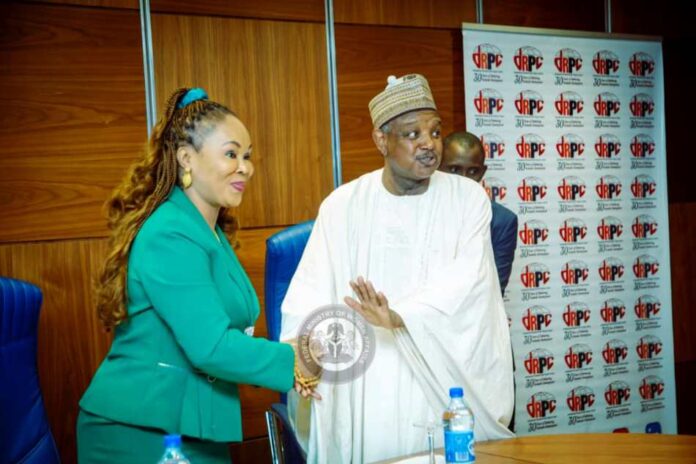 Kennedy-Ohanenye Honourable Minister of Women Affairs, Barrister (Mrs) Uju Kennedy-Ohanenye welcoming the Honourable Minister of Budget and Economic Planning, Senator Abubakar Bagudu, to the 2nd Meeting of the High-Level Advisory Council on the Support of Women and Girls in Nigeria held today in Abuja