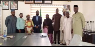 The Acting Executive Director, NIWRMC, Mrs Sakinatu Abbo Jimeta (M), Management Staff of the Commission and representatives of Nigerian Breweries PLC in a group photograph