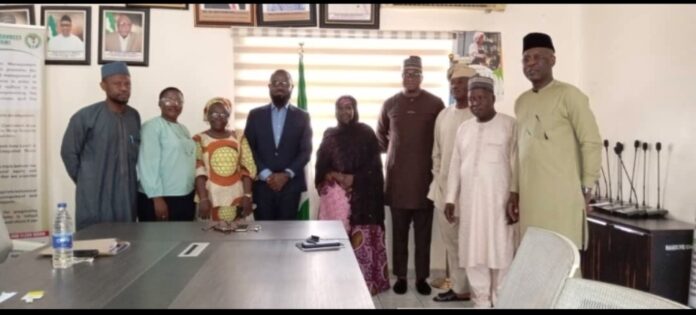 Mrs Sakinatu Abbo Jimeta The Acting Executive Director, NIWRMC, Mrs Sakinatu Abbo Jimeta (M), Management Staff of the Commission and representatives of Nigerian Breweries PLC in a group photograph