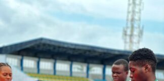 800m Boys Final : Permanent Secretary, Federal Ministry of Sports Development. Mrs, Tinuke Watti, Presenting Medals to 800m Boys winners Abubakar Tanimu. Niger (Gold), Honest Dike. Abia (Sliver) and Gift Omole. Delta(Bronze) 8th National Youth Games Delta 2024