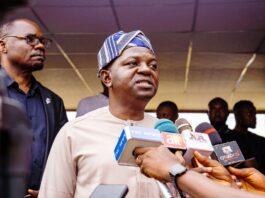 The Honourable Minister of Water Resources and Sanitation, Prof Joseph Terlumun Utsev, addressing newsmen during the distribution of Fertilizers/ Irrigation equipment to Benue farmers