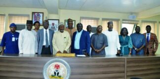 Front row,(Middle) Representative of RMAFC Chairman, Engr. Muhammed Sanni Baba, 2nd right, Dr. Abayomi Taofik Alaga, and others in a group photograph.