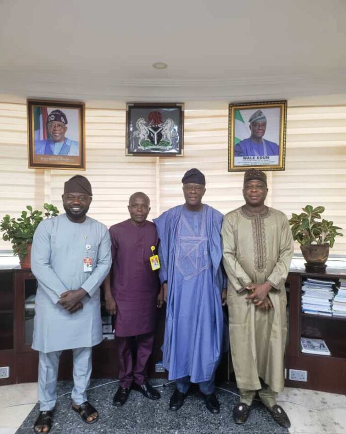 ASCSN Courtesy visit of some Union leaders of the Association of Senior Civil Servants of Nigeria (ASCSN) Finance Chapter to the Honourable Minister of Finance and Coordinating Minister of the Economy, Mr. Wale Edun on: Strengthening Collaboration for Enhanced Workforce Welfare in the Ministry and Economic Development. From the righ-hand side of the HMF&CME is Comrade Nuhu Abubakar Bah, Chairman ASCSN, next is Comrade Oche John, Secretary JUC, and to the left side of the Minister is Comrade Maijama Salisu, Ex-officio in a group photograph after the courtesy call on the Minister in his office in Abuja today