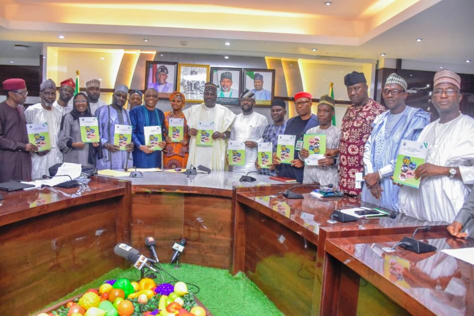 The Minister of State for Agriculture and Food Security, Sen.Dr Aliyu Sabi Abdullahi, Directors in the Ministry, and other stakeholders during the presentation in Abuja.