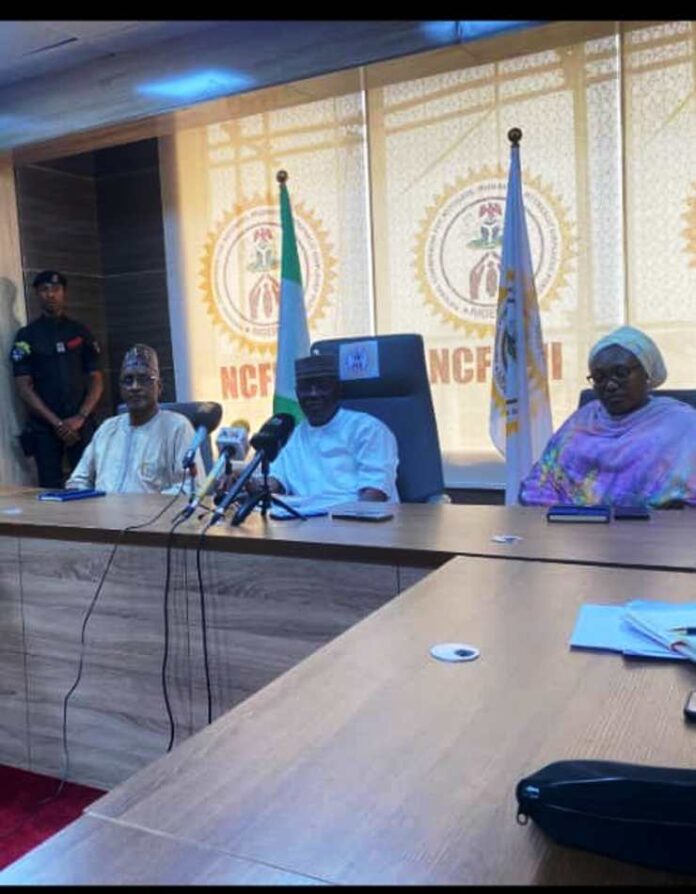 Attack on National Open University Centre in Nsu Ehime, Imo State The Honourable Federal Commissioner, Honourable Tijani Aliyu Ahmed at the middle, Director Internally Displaced Persons Hajiya Fatima Mamman Daura at the right, Director HRM Bello M Bello left during the the Press conference
