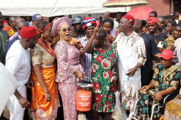 Distribution of Lifeline To Vulnerable Nigerians3 Honourable Minister of Women Affairs, Barrister (Mrs) Uju Kennedy-Ohanenye presenting a gas cylinder to one of the beneficiaries in Awka, Anambra State.