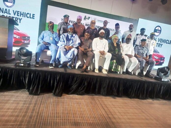 Economic Growth With VREG Middle Right: Hon. Seun Osiyemi, Honourable Commissioner of Transportation, Lagos State, Hajiya Jumai Katagom, Head PPP Unit, Federal Ministry of Finance, Abuja and others in a group photography at the South West Zonal sensitization seminar on National Vehicle Registry (VREG) held today in Lagos.