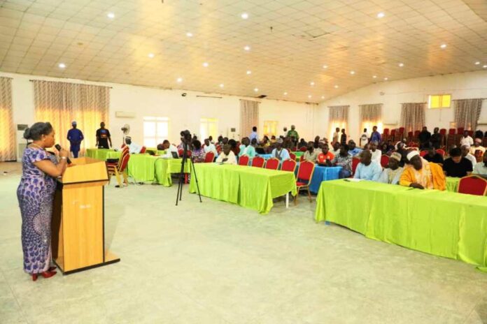 FG Canvasses For Sustainable, Responsible Mining1 Dr. Vivian Okono, Director Mines Environmental Compliance Department addressing Mineral Title Holders, Mining Host Communities & Relevant Stakeholders during a Sensitisation Workshop on behalf of the Permanent Secretary, Ministry of Solid Minerals Development