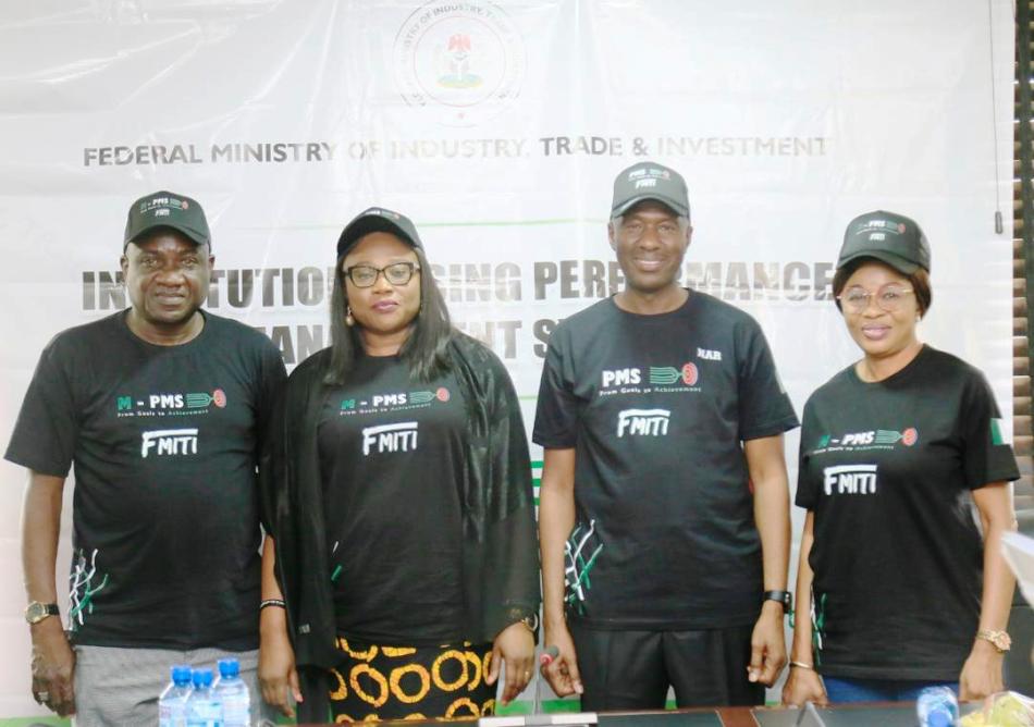 Dr Chinyere Akujobi PS fédéral ministry of livestock development and Team Lead PMS War Room OHCSF(2nd left) and PS FMITI Amb Nura Abba Rimi (right) at the official launch Performance Management Service at the Federal Ministry of Industry Trade and Investment today in Abuja. Both flanked by Director planning Mr Joseph Yilwa (1st left ) and HR Director Mrs Amaka Onwura (1st right)