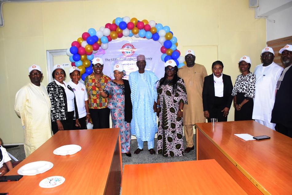 The National Coordinator SERVICOM PRESIDENCY Mrs Nnenna Akajemeli with member staff of SERVICOM Presidency Office during the course of the week- long celebration.