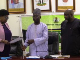 Director of Planning Research and Statistics, Mrs Azeez Margaret, and Permanent Secretary, Mr. James Sule official signing ceremony for the performance bond/contract with the Honourable Minister at the Headquarters of the Ministry in Abuja.