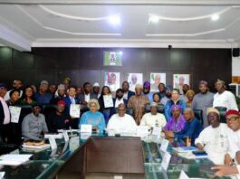 The Minister of Health and Social Welfare, Prof. Mohammed Ali Pate (C) and the representative of the Minister of Agriculture and Food Security, Director, Department of Planning and Policy Coordination, Mr Ibrahim Tanimu (Fifth from Left),during the launching of the New National Action Plan in Abuja.
