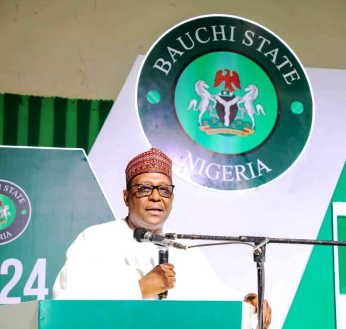 Performance Management System4 The Coordinating Minister for Health & Social Welfare, Prof. Muhammad Ali Pate addressing Staff and participants from the Ministry's agencies nationwide during the opening ceremony of 2024 Ministerial Leadership Retreat on Performance Management Systems in Bauchi State.
