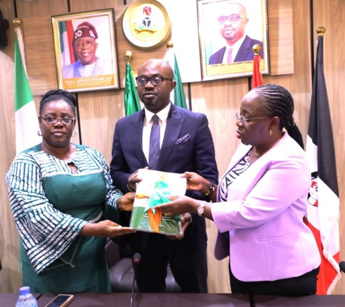 Phase 1 Report on Correctional System Reforms1 L-R: Dr. Uju Agomoh, President of Prisoners' Rehabilitation and Welfare Action (PRAWA); Dr. Olubunmi Tunji-Ojo, Hon. Minister of Interior and Dr. Magdalene Ajani, Permanent Secretary, Ministry of Interior during the submission of the phase one report of independent investigative panel on alleged corruption and other violations of SOP within NCoS