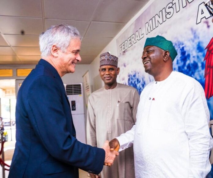 Sustainable Power and Irrigation Project in Nigeria11 The Honourable Minister of Water Resources and Sanitation, Engr. Prof. Joseph Terlumun Utsev ( R) in a warm handshake with the World Bank Regional Director for West and Central Africa, Chakib Jenane (L). With them is the Honourable Minister of State for Water Resources and Sanitation Rt. Hon.Bello Muhammad Goronyo Esq. ( M) during the announcement of the approval of the SPIN project on Thursday, 3rd October in Abuja