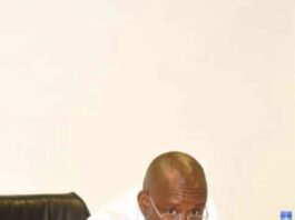 The Hon minister of sports Development,Sen John owan Enoh, at the inauguration of members of the ministerial Delivery committee