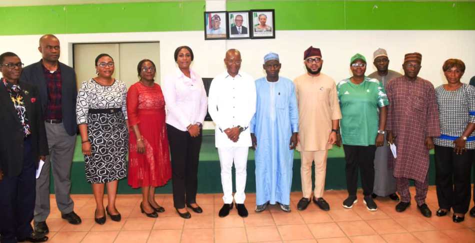The Hon. Minister of Sport Development, Sen. John Owan Enoh in a group photograph with the newly inaugurated Ministerial Delivery Committee (MDC) on Wednesday, 3rd, October, 2024 at the media centre, MKO Abiola National Stadium, Abuja