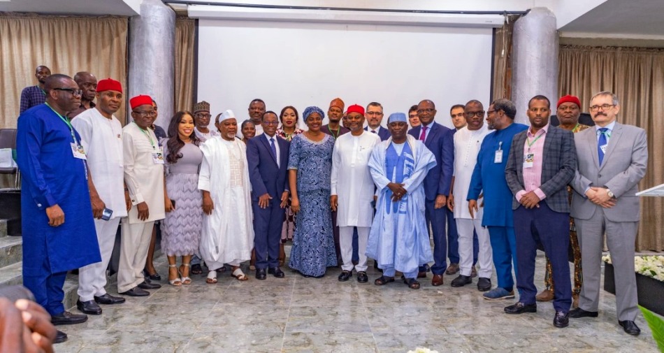 Hon. Minister of Innovation, Science and Technology, Chief Uche Geoffrey Nnaji (7th right) Permanent Secretary, Federal Ministry of Innovation, Science and Technology, Mrs. Esuabana Nko Asanye (7th left) Representative of African Development Bank (AfDB), Prof. Alfred Cubana (6th left) Director-General, Raw Materials Research and Development Council (RMRDC) Prof. Nnanyelugo Martin Ike-Muonso (3rd right) Former Director-General, Raw Materials Research and Development Council (RMRDC), Dr. Abdullahi Aliyu (5th left) Technical Adviser, Donor and Funding Institutions, Ms. Ure Utah (4th left) and others in a group photograph at the RMRDC Programme Presentation and Dialogue Session with Development Partners, Diplomatic Communities and Business Councils 2024 Edition, held in Abuja.