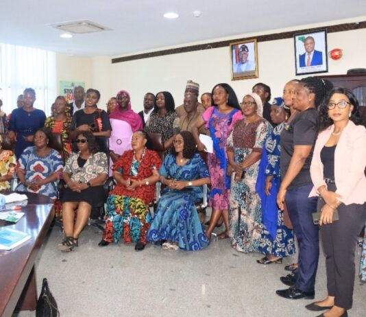 3rd left - Rep of the Honourable Minister, Women Affairs, Mrs Friya Bulus, Director, Legal - Mrs Chioma Ibe-Okafor, other Directors and participants at the Stakeholders planning meeting for the 16 days of Activism against GBV held yesterday in Abuja