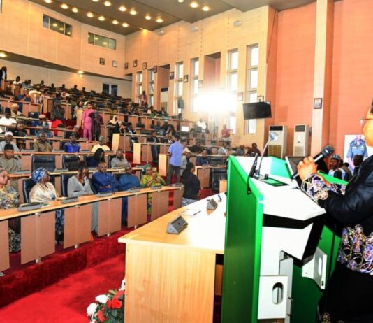 HCSF, Mrs Didi Esther Walson-Jack, OON, mni, reading her Address during the launch of the Service-Wise GPT, Federal Civil Service On-Line Academy and Govmail digitalisation tools in Abuja.