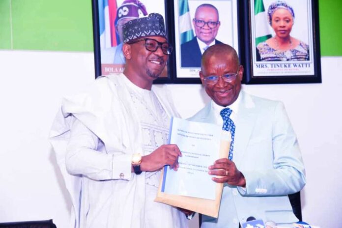 Dikko Assumes Office4 The outgoing Minister of Sport Development, Sen. John Owan Enoh and the newly appointed Chairman National Sports Commission, Mallam Shehu Dikko, during the handover ceremony held at the Media Centre, Moshood Abiola National Stadium, Abuja
