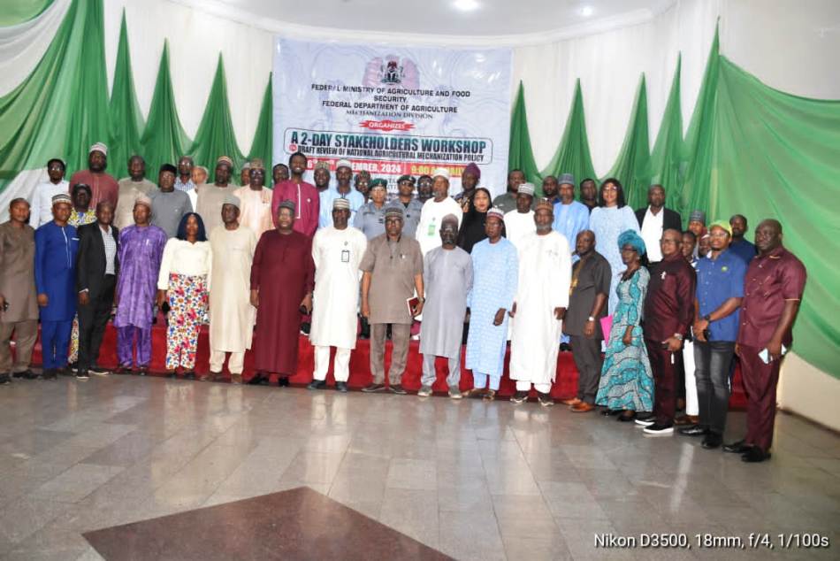 The Representative of the Permanent Secretary, FMAFS, Director, Department of Planning and Policy Coordination, Mr Ibrahim Tanimu (C) and other Stakeholders, during the workshop.