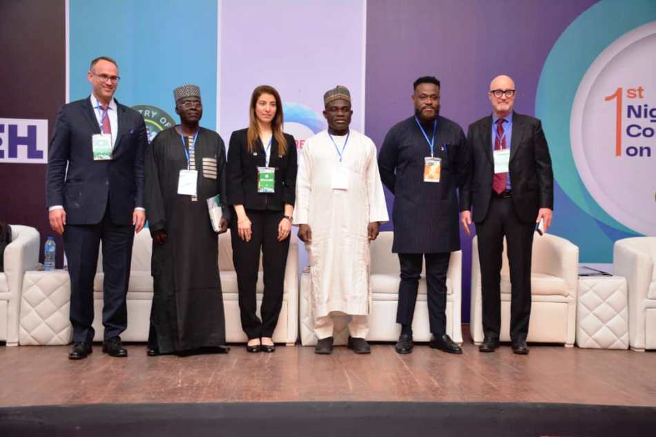 Director of Upstream Department, Ministry of Petroleum Resources; Engr.kamoru Busari FNSE (3rd right) in a group photograph with Panelists at the Hydrogen Conference.