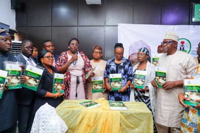 Permanent Secretary Kachollom Daju mni, on behalf of Honourable Coordinating Minister, Launched the Five-Year Strategic Plan of Action For Occupational Health and Safety Services In Nigeria; she is supported by Directors of Departments of the Ministry and Stakeholders.