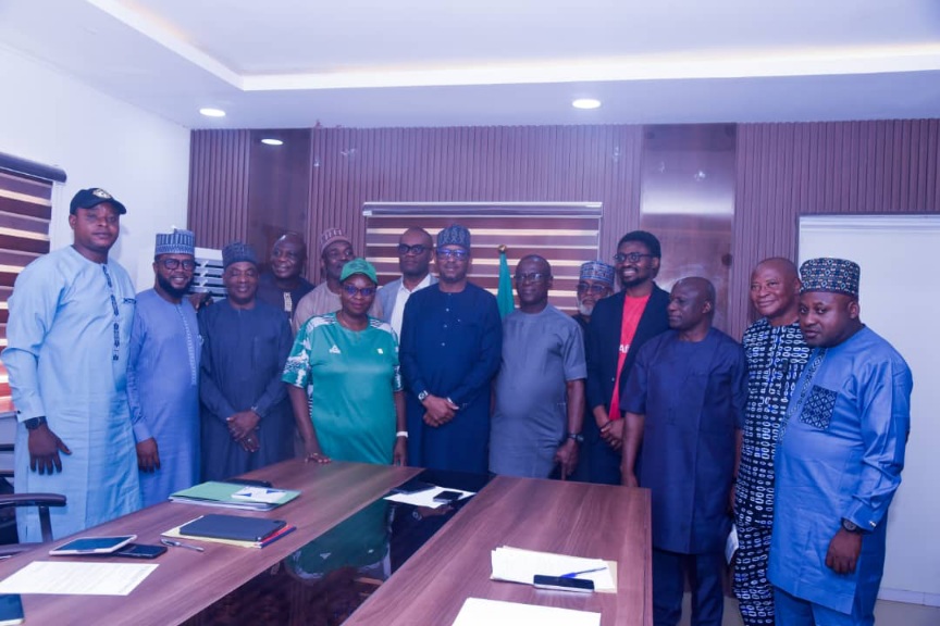 The Chairman, National Sports Commission, Mallam Shehu Dikko in a group photograph with the NPFL Club Owners Association, led by their Chairman, Chief Okey Kpalukwu and other management teams of the Commission, when the association payed a courtesy visit to the Chairman in his office on Thursday, 7th November, 2024