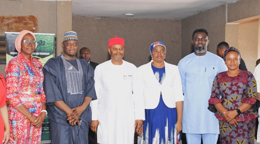 Hon. Minister of Innovation, Science and Technology, Chief Uche Geoffrey Nnaji (3rd left) Permanent Secretary of the Ministry, Mrs. Esuabana Nko Asanye (3rd right) President, Nutrition Society of Nigeria Prof. Salisu Maiwada Abubakar (2nd left) Senior Project Manager, Grand Challenge Nigeria, Godwin Bamsa (2nd right) Chairman, Nutrition Society of Nigeria FCT, Major Edit Ogheneovo (left) and National Treasurer, Nutrition Society of Nigeria Simpa Syzan (right) at the Signing of Memorandum of Understanding (Mou) Between the Ministry and Grand Challenge Nigeria (GCNg) today in Abuja.