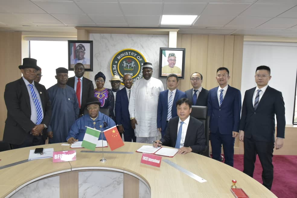 The Representative of the Honourable Minister and Permanent Secretary, MPR. Amb. Nicholas Agbo Ella (5th right) flanked by the officials of BGI Group and CNCEC in a group photograph at the agreement signing ceremony.