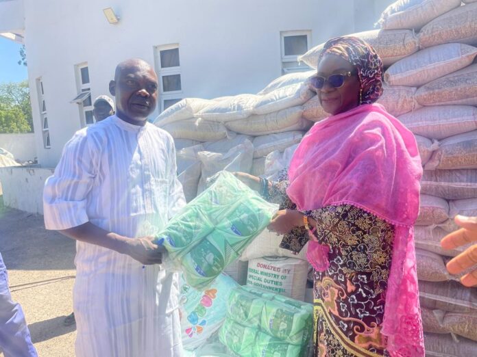 IMG-20241117-WA0052 The Permanent Secretary, Dr. Maryam Ismaila Keshinro, handing over the relief materials to the representative of the Borno State Government.