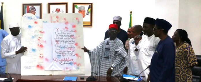 L-R: Director of Police Services Department, Ibrahim Muhammed, Retired Permanent Secretary, Mr. James Sule; Director of Finance and Accounts, Okehie Isaac Tochukwu; Director Overseeing Perm Sec Office, Yusuf Abubakar Argungu; Director (Reforms and Innovation Coordination), Dr. Ogbu Fabian Ejiofor; Director of Police Inspectorate Department, Mrs. Bola Blessing Aderele; Head (Information & Public Relations), Bolaji O. Kazeem and Deputy Director, Human Resource Management, Amos James during the send-forth ceremony organized by the Ministry for the retired Permanent Secretary held at the Headquarters of the Ministry in Abuja.