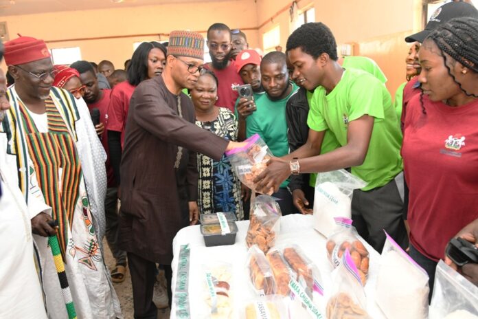 Pix Jos Leadership His Royal Highness, Ada Emmanuel Ajik, Adagwom of the Jos Izere Chiefdom, and the Permanent Secretary of the Ministry, Mr. Olubunmi Olusanya, inspecting the exhibition showcasing agricultural products from the training programme.