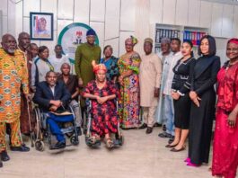 ( 2nd row, 9th Right), Honourable Minister of Humanitarian Affairs and Poverty Reduction Prof. Nentawe Goshwe Yilwatda, (8th Right) Felicia Yakzum, (front row 1st left), Convener of the National Disability Civil Rights , Job Napoleon, (front row,1st Right) leader of the Pioneer of Nigeria National Disability Civil Rights Movements, Lady Omotunde Ellen Thompson, and other dignitaries during the courtesy visit on the Minister, Tuesday 19th November 2024 at the Ministry's Headquarters Abuja
