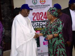The National Coordinator/ CEO SERVICOM Presidency, Mrs Nnenna Akajemili in an handshake with the Permanent Secretary Federal Ministry of Education, Dr Nas'r Sani- Gwarzo, during the Ministry's year 2024 Customer Service Week Celebration in Abuja