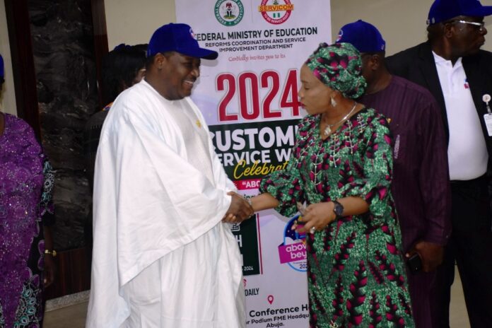 Teachers Training and Development2 The National Coordinator/ CEO SERVICOM Presidency, Mrs Nnenna Akajemili in an handshake with the Permanent Secretary Federal Ministry of Education, Dr Nas'r Sani- Gwarzo, during the Ministry's year 2024 Customer Service Week Celebration in Abuja
