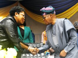 R-L: The Minister of Marine and Blue Economy, His Excellency, Adegboyega Oyetola, CON, in a handshake with the Head of the Civil Service of the Federation, Mrs Didi Esther Walson-Jack, OON, mni, at the Opening Ceremony of 39th Annual National Conference in Abuja.