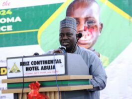 Dr Salaudeen Jimoh mni Director Hospital Services Department of the Ministry of Health & Social Welfare addressing participants at the ORAL DAY/ NOMA : Dr. Jimoh represented the Honourable Minister of State for Health & Social Welfare, Dr Iziaq Adekunle Salako.