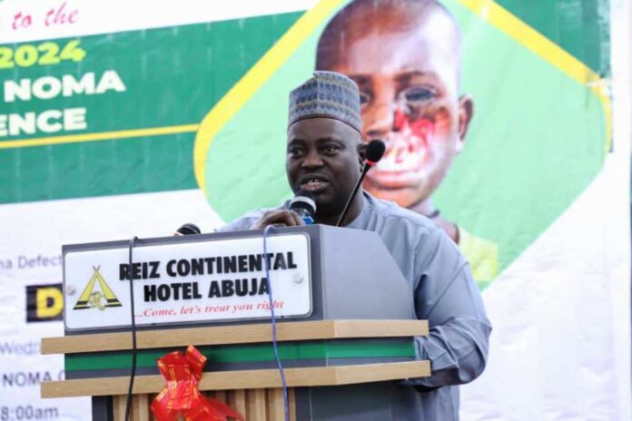 2024 National Oral Health and Noma Day1 Dr Salaudeen Jimoh mni Director Hospital Services Department of the Ministry of Health & Social Welfare addressing participants at the ORAL DAY/ NOMA : Dr. Jimoh represented the Honourable Minister of State for Health & Social Welfare, Dr Iziaq Adekunle Salako.