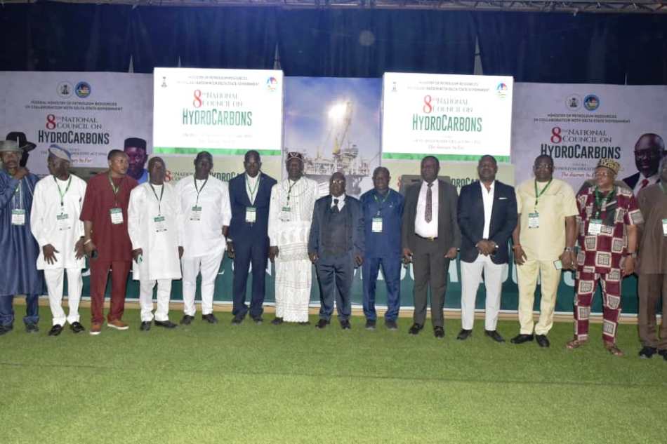Representative of the Permanent Secretary, MPR and Director of Upstream Department of the Ministry Engr. Kamoru Busari FNSE (5th right) in a group photograph with other participants and stakeholders in the oil and gas sector at the 8th edition of the National Council on Hydrocarbons held in Asaba, Delta State.