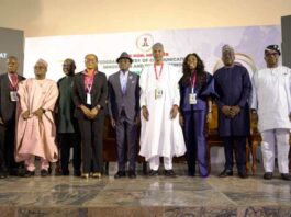 R - L: His Excellency, The Executive Governor of Benue State Rev fr Dr. Hyacinth Iormem Alia and The Permanent Secretary, Federal Ministry of Communications, Innovation and Digital Economy Engr. Faruk Yusuf Yabo all (middle) in a group photograph with the Chief Executive Officers of the ministry's in Makurdi at the 12th NCCIDE