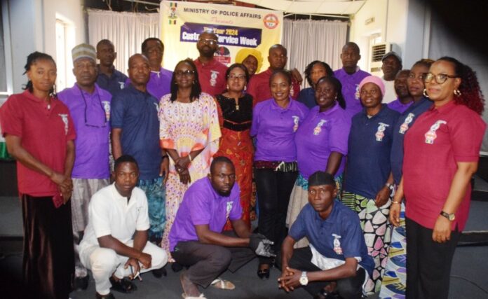 Acting Perm Sec Charges Staff L-R: Joy Abobo (Police Services Department); Madaki Danladi Geoffry; Chief Administrative Officer, Showunmi Ola Akeem; Assistant Director (Police Services Department), Kole Doris; SERVICOM Team Lead, Mrs. Lucy Zach-Ukoh; Bere Dorathy; Gloria Samuel (Planning Research and Statistics); Ameh Okwuchukwu (Legal Services); Kazi Pheobe Ginika (Accounts) and Tide Mariam Braimah (Human Resource Department) during the Year 2024 Servicom Customer Service Week, held at the Office of the Secretary to the Government of the Federation Conference Room, Phase I, Federal Secretariat, Abuja.