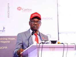 Commemorating Worlds AIDS DAY: The Honourable Minister of State for Health & Social Welfare, Dr. Iziaq Adekunle Salako delivering key note address at the event, which held at NAF Centre Abuja.