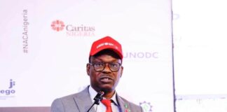 Commemorating Worlds AIDS DAY: The Honourable Minister of State for Health & Social Welfare, Dr. Iziaq Adekunle Salako delivering key note address at the event, which held at NAF Centre Abuja.