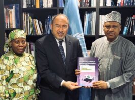 L-R: Nigeria’s Ambassador and Permanent Delegate to UNESCO, Dr. Hajo Sani; UNESCO Assistant Director-General for Communication and Information, Dr. Tawfik Jelassi presenting a copy of the Guidelines for the Governance of Digital Platforms to the Minister of Information and National Orientation, Mohammed Idris, at a meeting in Paris on Thursday on the sidelines of President Tinubu’s State Visit to France.
